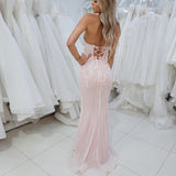 Sparkling pink dress with strapless deep V neckline and corset back