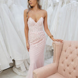 Sparkling pink dress with strapless deep V neckline and corset back
