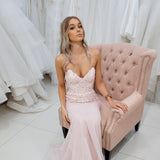 Sparkling pink dress with strapless deep V neckline and corset back