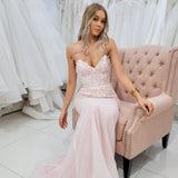Sparkling pink dress with strapless deep V neckline and corset back