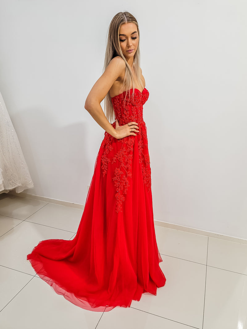 Red bustier top tulle dress with slit for hire