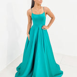 Turquoise green with crescent moon neckline and bowed back