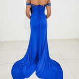 Sparkling jersey royal blue column shaped dress with crescent moon neckline and high slit for hire