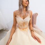 Strapless sparkling light gold tulle princess dress for hire