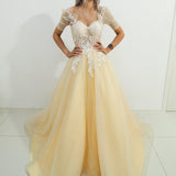 Sparkling light gold tulle princess dress with sleeves for hire