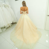 Strapless sparkling light gold tulle princess dress for hire