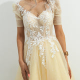 Sparkling light gold tulle princess dress with sleeves for hire
