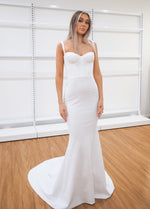 White bustier mermaid dress with lace up back