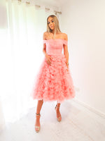 Pastel pink straight neck line with off the shoulder and tulle skirt up to the knees for hire.
