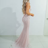 Sparkling pink dress with strapless deep V neckline and corset back fore hire.
