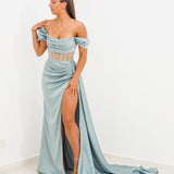 Sage green satin column dress with off the shoulder sleeves