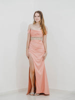 Inspired coral satin column dress with off the shoulder and high slit