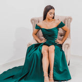 Emerald green Satin column dress with off the shoulder sleeves and high slit
