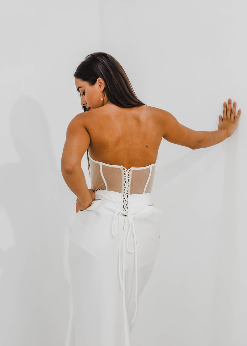 White bustier top with transparent bodice and high slit dress