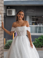 Larisa white sequins and beads all over the dress with off the shoulder sleeves for hire