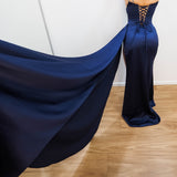 Navy blue satin column dress with 2 sparkling angle straps and high slit for hire