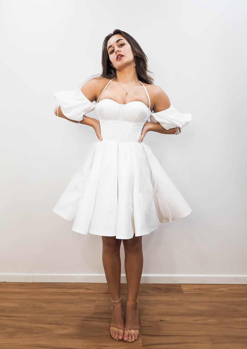 White satin short dress with off the shoulder sleeves