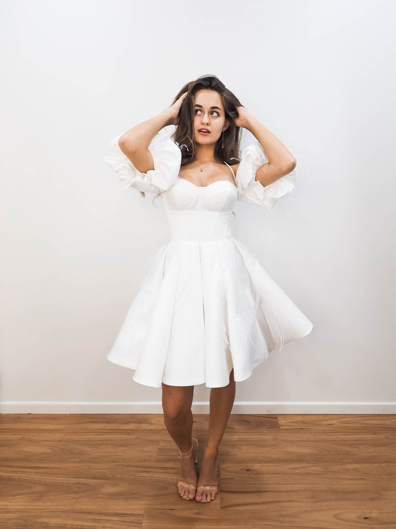 White satin short dress with off the shoulder sleeves for hire