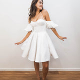White satin short dress with off the shoulder sleeves for hire