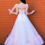 Polka dot baby pink bustier dress with lace up back