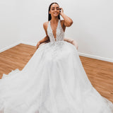 Sparkling white V neck wedding dress for hire