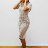 Sparkling nude with sequence dress for hire