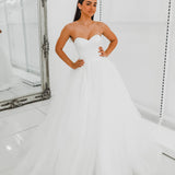 White sweetheart neckline and satin bodice with puffy tulle skirt wedding dress