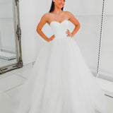 White sweetheart neckline and satin bodice with puffy tulle skirt wedding dress