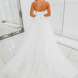 White sweetheart neckline and satin bodice with puffy tulle skirt wedding dress