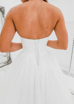 White sweetheart neckline and satin bodice with puffy tulle skirt wedding dress for hire