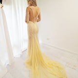 Sparkling Gold Beaded Deep V Mermaid Dress with long sleeves for hire.