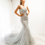 Silver mermaid dress with long train for hire