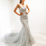 Silver mermaid dress with long train for hire