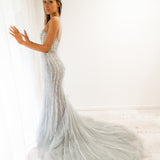 Silver mermaid dress with long train for hire