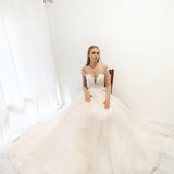 Blush pink long sleeves princess gown for hire