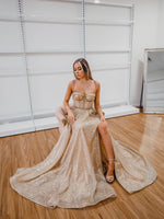 Sparkling gold bustier cup dress for hire