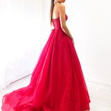 Sparkling dark red tulle dress with beaded top for hire