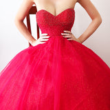 Sparkling dark red tulle dress with beaded top for hire