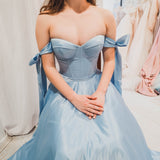 Bustier corset baby blue dress with self-tie bows for hire