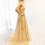 Sparkling gold bustier dress