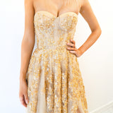 Sparkling gold bustier dress