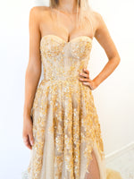 Sparkling gold bustier dress