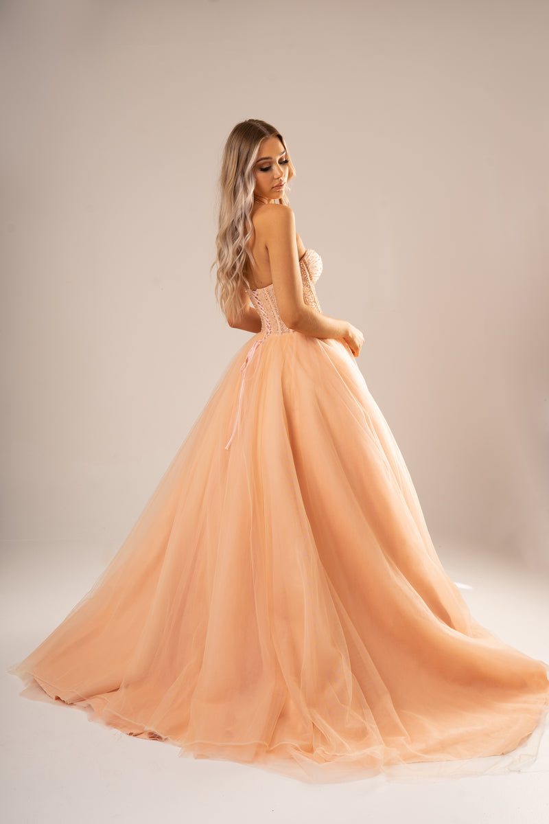 Sparkling peach nude bustier dress for hire