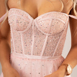 Polka dot baby pink bustier dress with lace up back