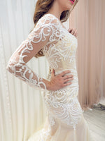 Nude mermaid dress with symmetrical lace