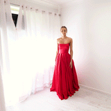 Bright red satin princess dress with crescent moon neckline